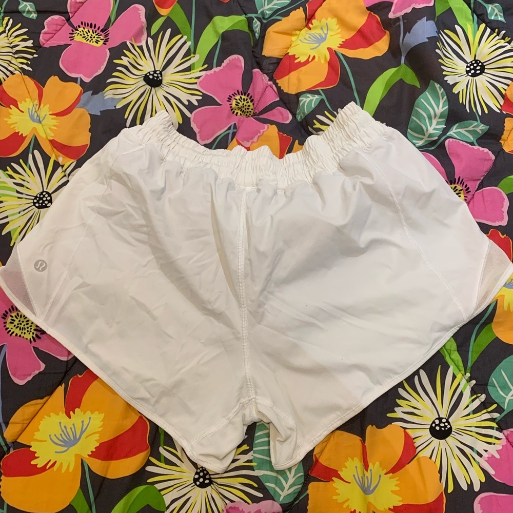 size 8 white lululemon hotty hot shorts! brand new